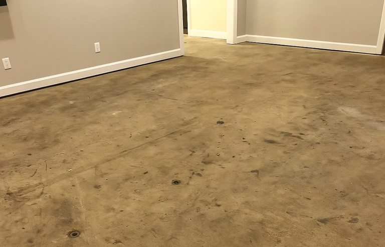 Before-and-after of garage floor: plain concrete vs. dark gray flake epoxy coating with gloss finish